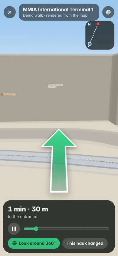 A demo Walk View, rendered from the map, for MMIA International Terminal 1: 1 min 30 to the entrance, an arrow along the way, Look around 360° and This has changed