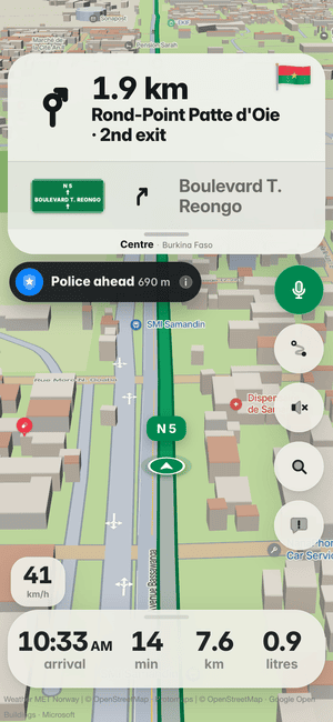 Driving in Ouagadougou: the “Police ahead 690 m” alert under the turn card, from other drivers’ reports