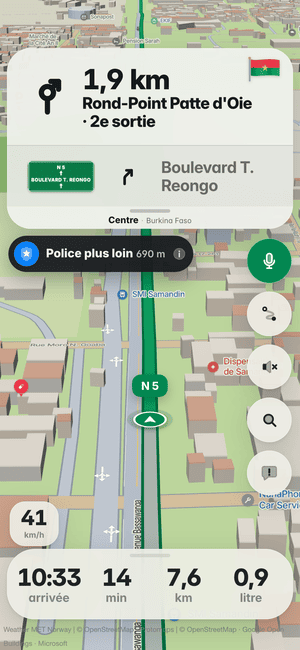Conduite à Ouagadougou : l’alerte « Police plus loin 690 m » sous la carte de virage, d’après les signalements d’autres conducteurs