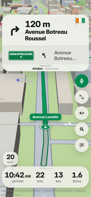 Driving in Abidjan: in 120 m, turn right onto Avenue Botreau Roussel; Côte d’Ivoire’s flag on the turn card