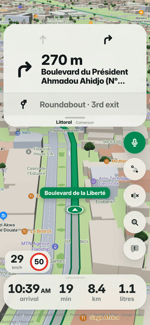 Driving in Douala: in 270 m, turn right onto Boulevard du Président Ahmadou Ahidjo (N° 1352)/P14, with the lane arrows; Cameroon’s flag on the turn card