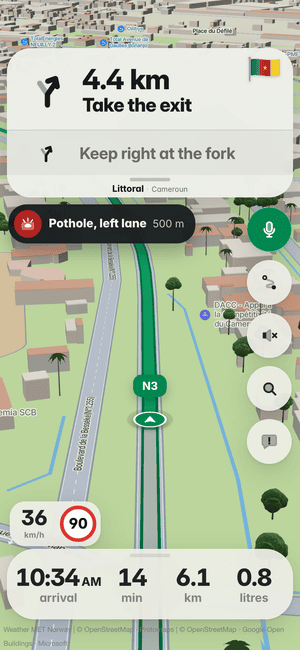 Driving in Douala: the “Pothole, left lane 500 m” banner, a pothole other drivers found ahead