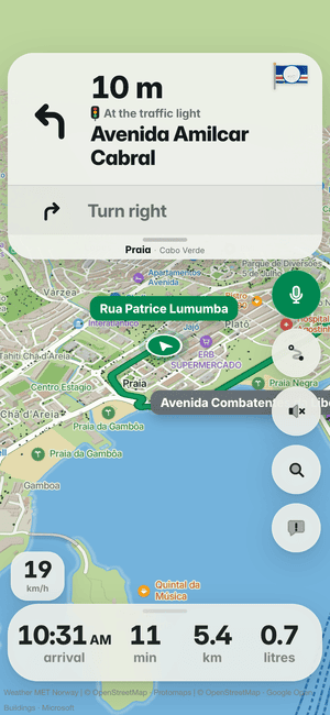 Driving in Praia: in 10 m, turn left onto Avenida Amilcar Cabral; Cabo Verde’s flag on the turn card