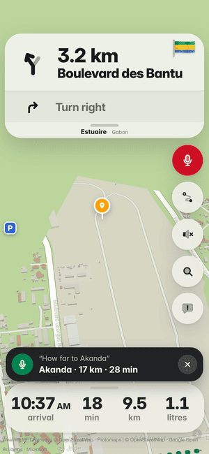 Driving in Libreville, asking by voice “How far to Akanda”; the answer: Akanda · 17 km · 28 min