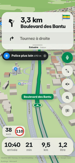 Conduite à Libreville : l’alerte « Police plus loin 690 m » sous la carte de virage, d’après les signalements d’autres conducteurs