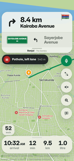 Driving in Banjul: the “Pothole, left lane 540 m” banner, a pothole other drivers found ahead