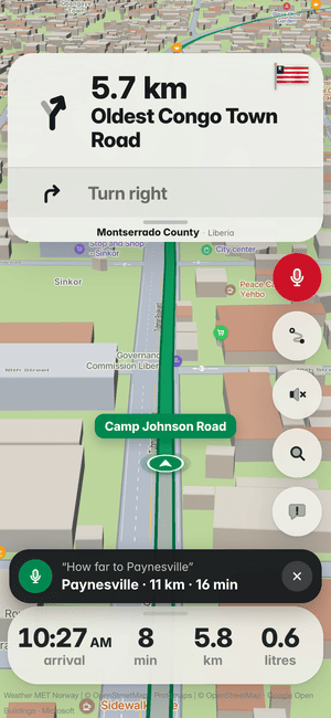 Driving in Monrovia, asking by voice “How far to Paynesville”; the answer: Paynesville · 11 km · 16 min