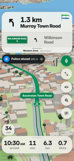 Driving in Freetown: the “Police ahead 680 m” alert under the turn card, from other drivers’ reports
