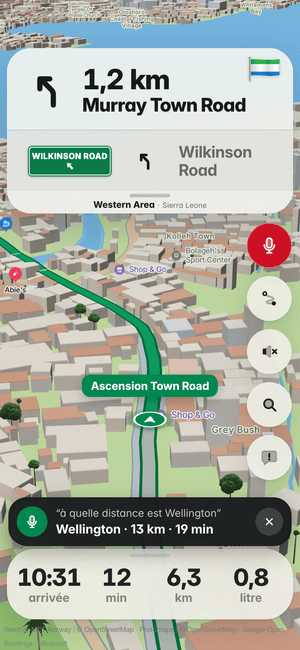 Conduite à Freetown, question à voix haute « à quelle distance est Wellington » ; la réponse : Wellington · 13 km · 19 min
