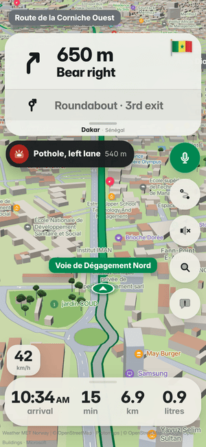 Driving in Dakar: the “Pothole, left lane 540 m” banner, a pothole other drivers found ahead