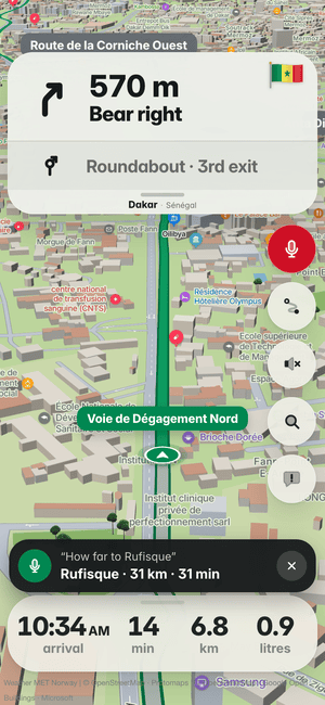 Driving in Dakar, asking by voice “How far to Rufisque”; the answer: Rufisque · 31 km · 31 min