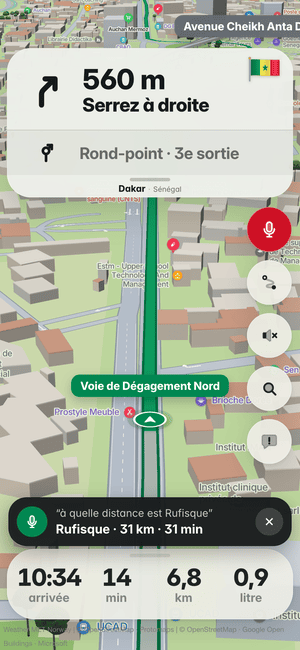 Conduite à Dakar, question à voix haute « à quelle distance est Rufisque » ; la réponse : Rufisque · 31 km · 31 min