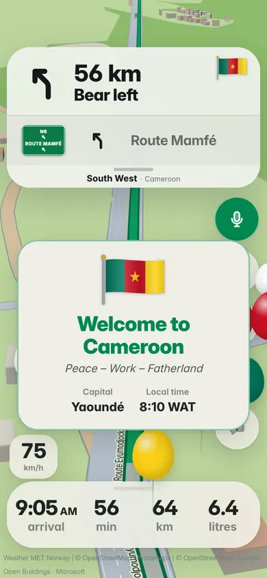 Welcome to Cameroon: the flag, the motto Peace – Work – Fatherland, the capital Yaoundé and the local time, 8:10 WAT, on the road to Mamfe in the South West